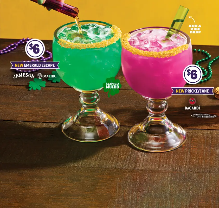 Two $6 sugar-rim cocktails from Applebee's, one green and one pink, on a wooden table; a “vibe drop” is added.